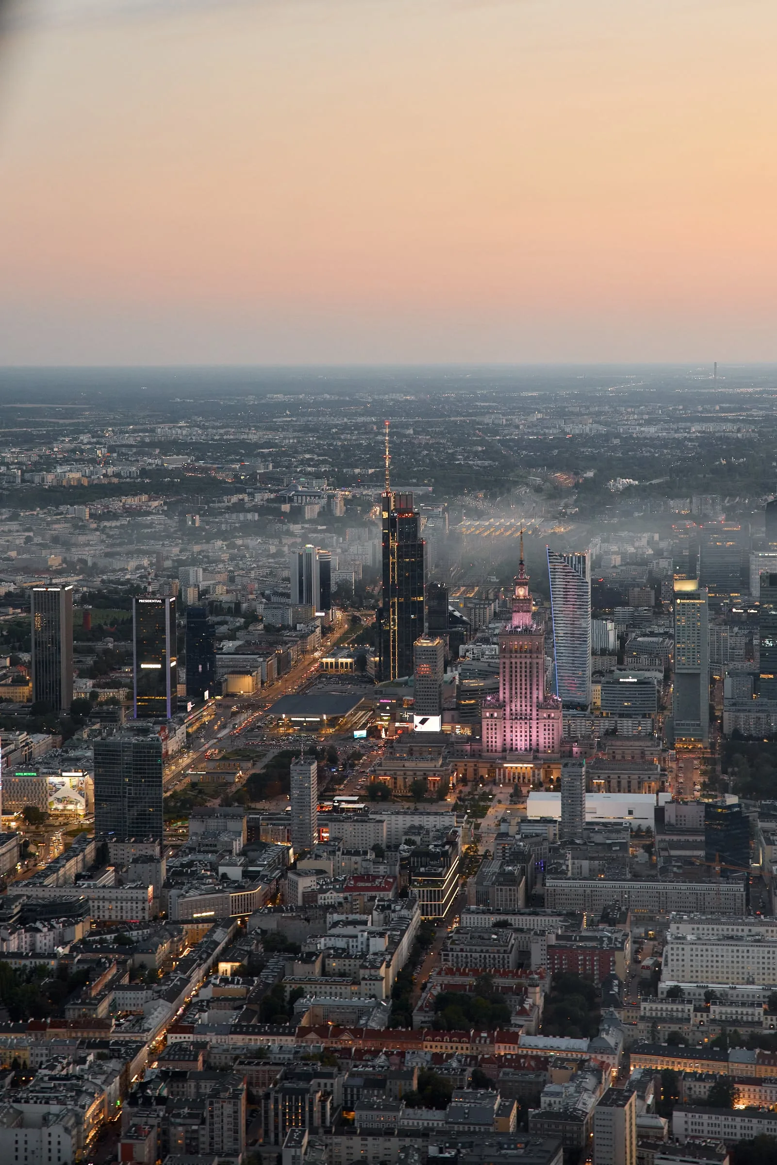 Evening aerial view of central Warsaw with the Palace of Culture and Science and skyscrapers