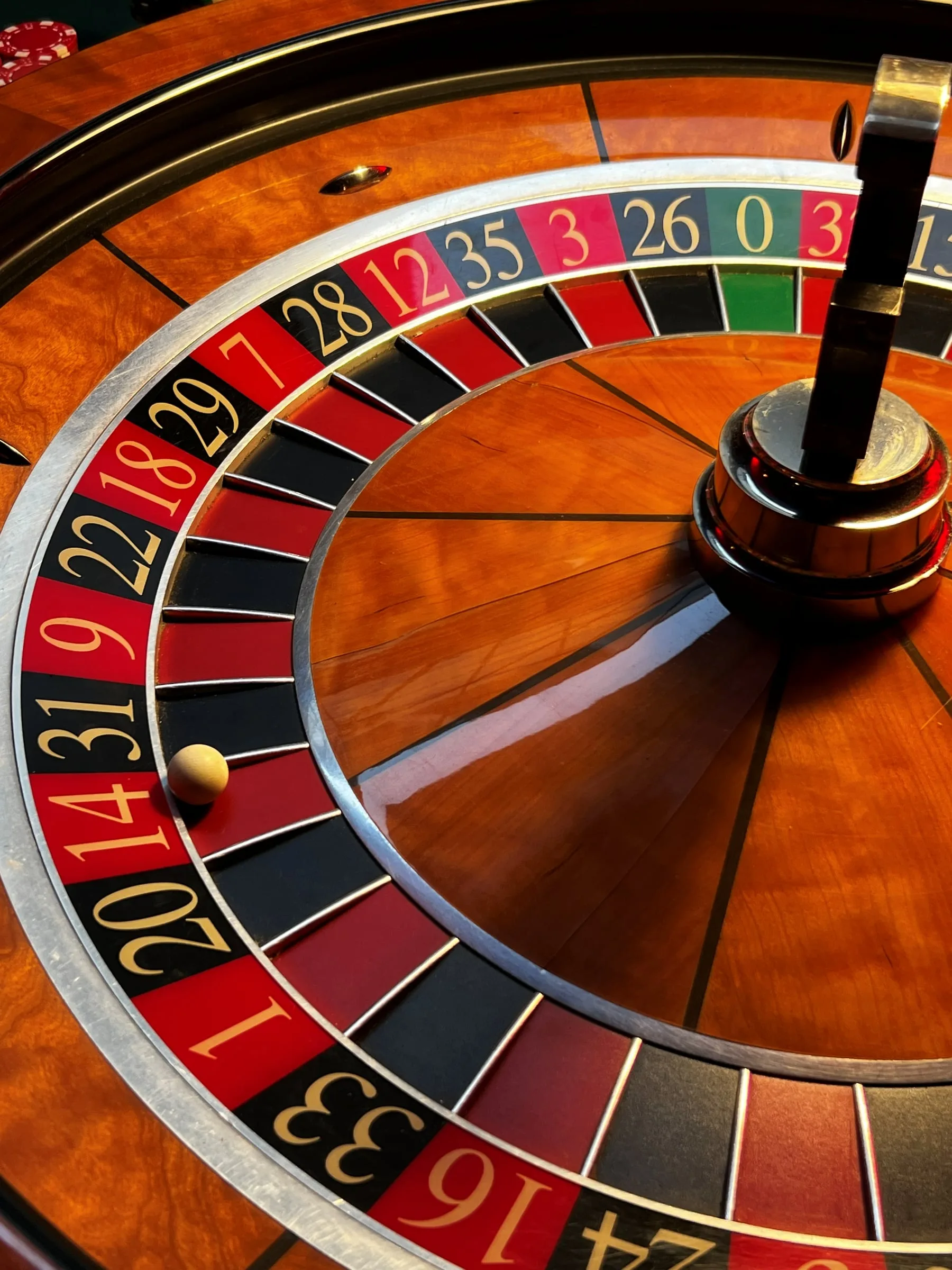 Close-up of a roulette wheel with the ball